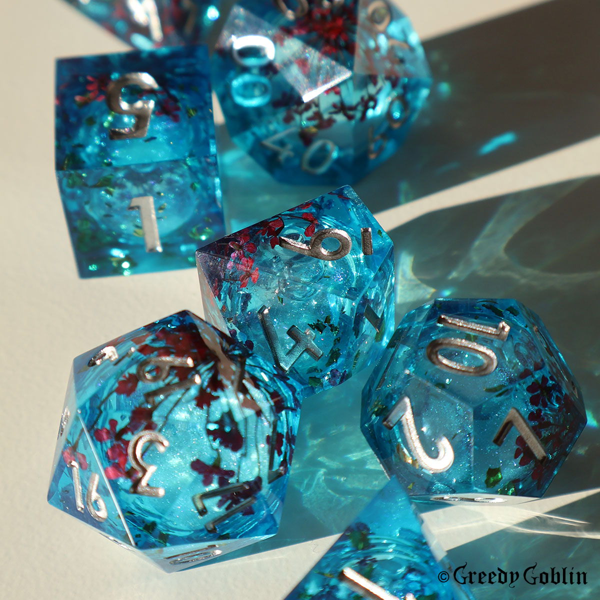 Liquid Core Dice Set (Transparent Blue with Red Flowers)