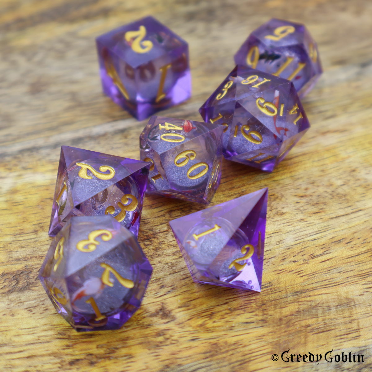 Liquid Core Dice Set Purple Fish Gold