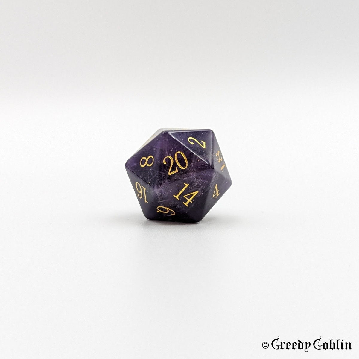 Amethyst gemstone D20 with gold numbers from Polydice set.