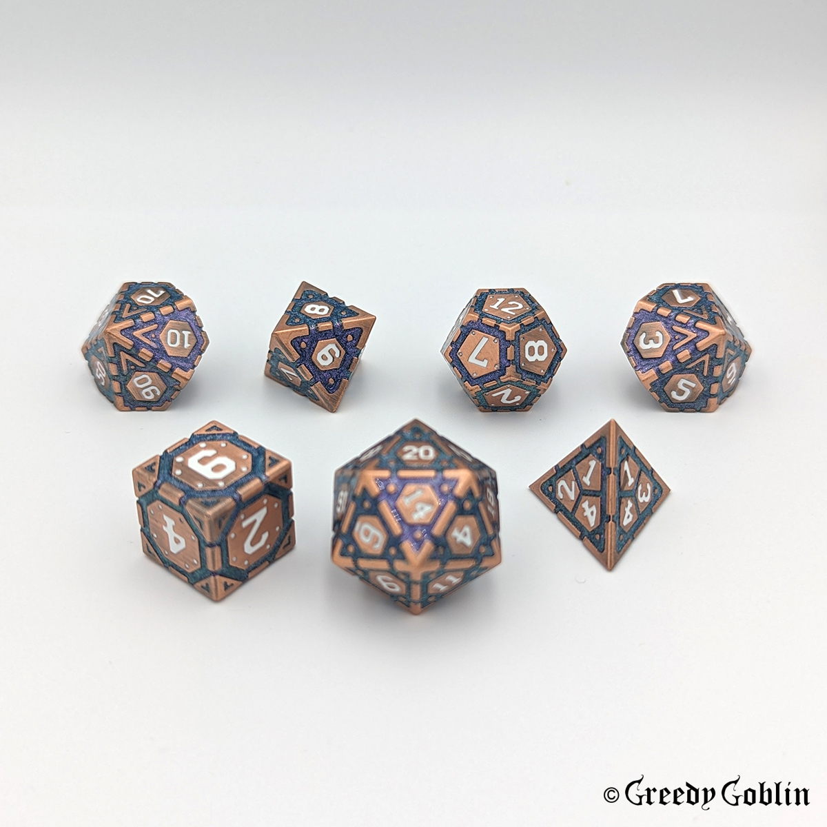 A set of DnD copper metal die. Displayed on a white background. The dice has purple-blue mica and white numbers.