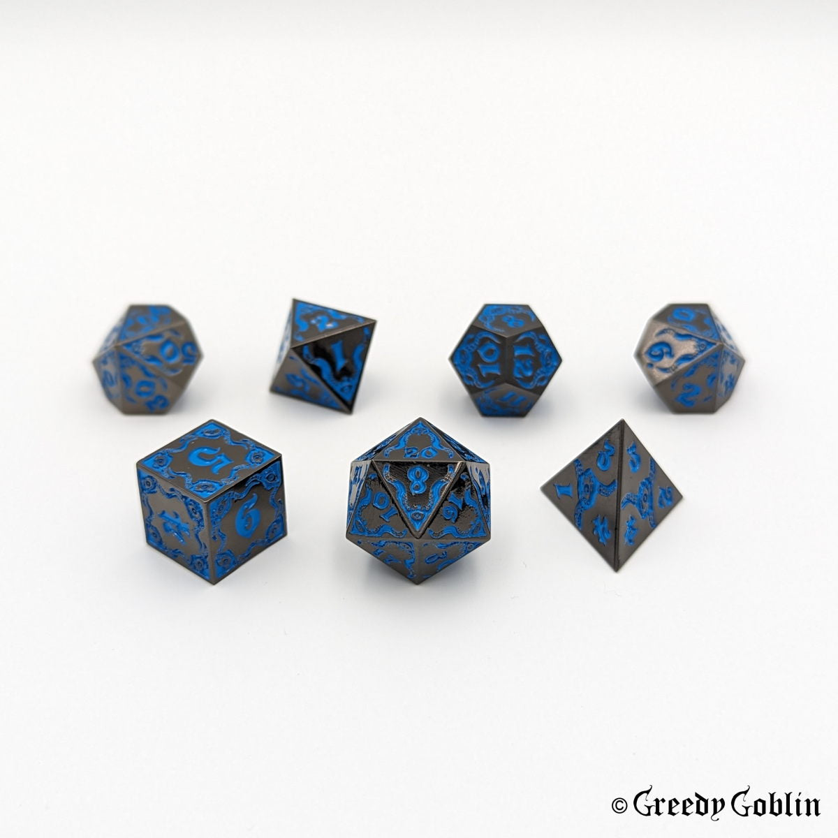 Cthulhu-themed DnD dice set in gunmetal with blue engravings and numbers (D4, D6, D8, D12, D20, 2x D10).