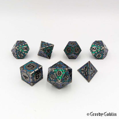 A set of seven polyhedral dice with intricate patterns, including a d20, d12, d10, d100, d8, d6, and d4, arranged on a plain white background.