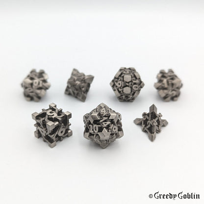 Dwarven Runestone Polydice Set (D100, D8, D12, D10, D6, D20, D4) with metal finish.